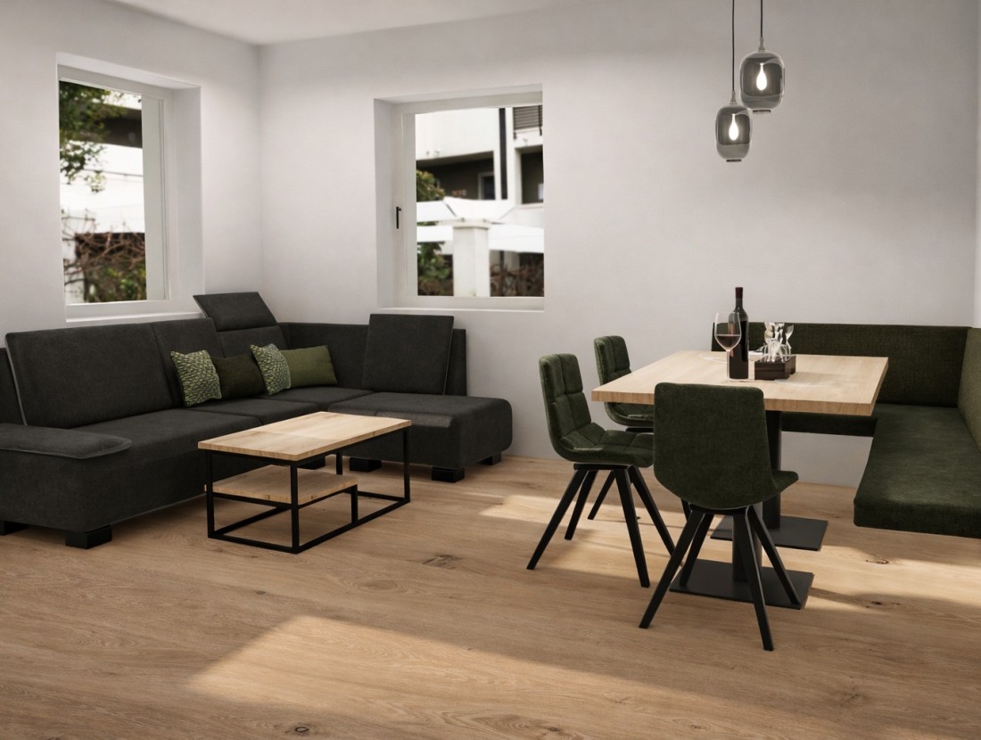 Moderne Wohnzimmer-Essbereich-Kombination mit Sofas, Tisch und H&auml;ngelampen